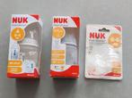 Set van 2 plastic baby drinkflessen NUK met reserve spenen., Ophalen of Verzenden, Nieuw