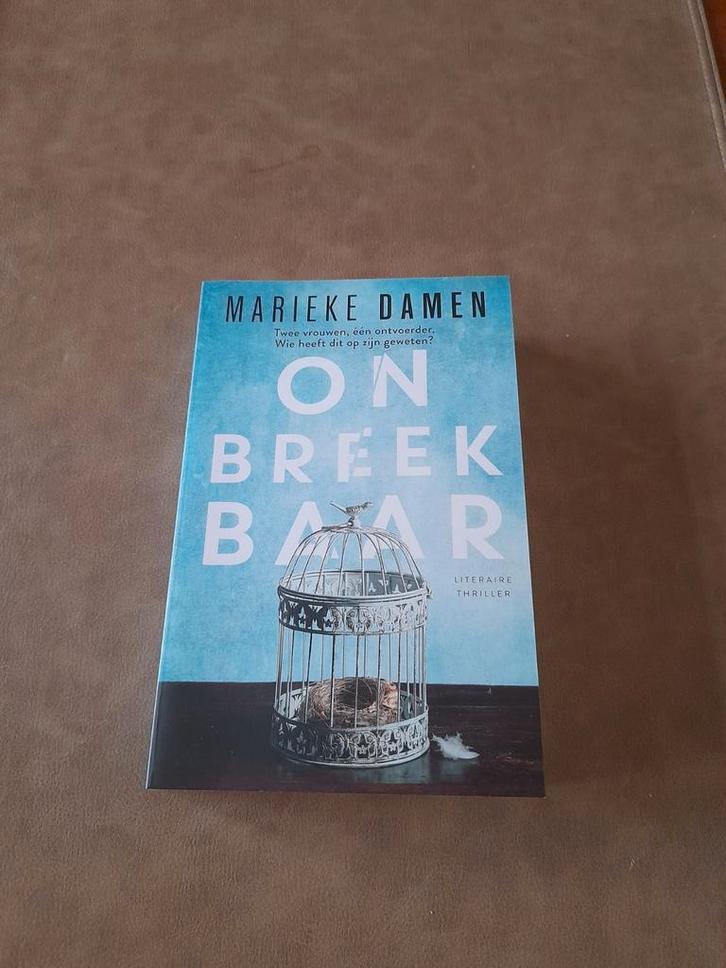 Marieke Damen - Onbreekbaar. 9000Gent, Boeken, Thrillers, Zo goed als nieuw, Ophalen of Verzenden