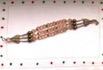 Bijou fantaisie Bracelet perles roses et dorées, Comme neuf, Autres matériaux, Rose, Avec bracelets à breloques ou perles