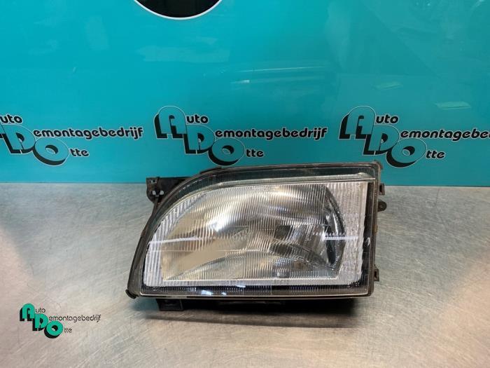 Koplamp links van een Ford Transit (Transit 91-), Auto-onderdelen, Verlichting, Ford, Gebruikt, 3 maanden garantie, Ophalen of Verzenden