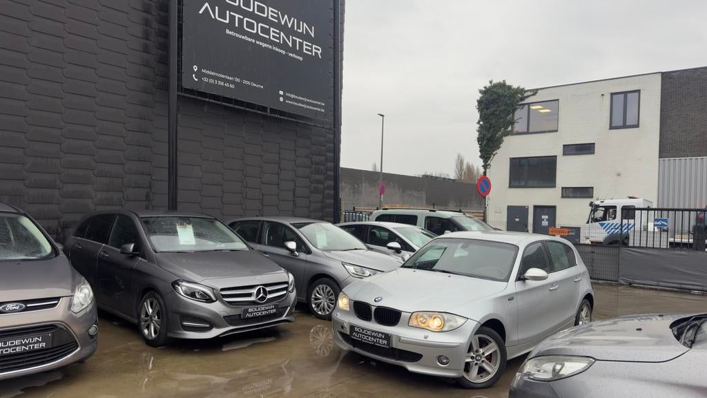 Bmw 120i 1 Serie 2.0Benzine Keyless Xenon Seat heating, Electronic Stability Program (ESP), Zwart, Handgeschakeld, 5 deurs