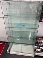 Vitrine avec portes coulissantes, Ophalen