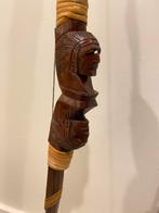 Afrikaanse houten boog, Ophalen