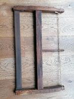 Ancienne scie de bûcheron à main, Enlèvement