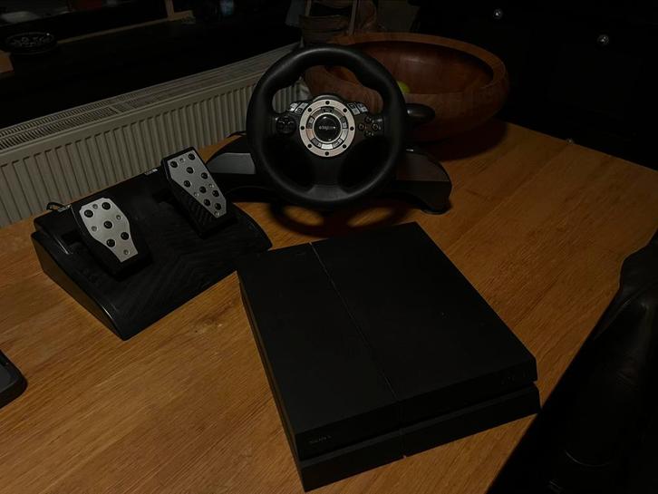 Pack PS4 Pro + Big Ben stuurwiel + 5 games, Games en Spelcomputers, Spelcomputers | Overige, Zo goed als nieuw, Ophalen