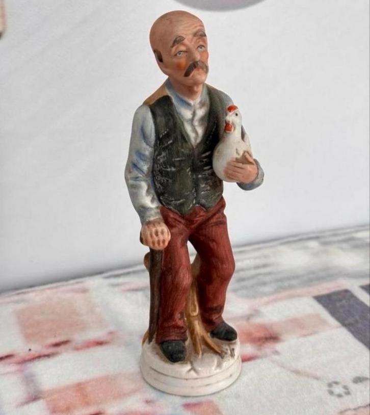 Figurine en porcelaine vintage 1990 Homme avec poulet 19CM, Collections, Statues & Figurines, Comme neuf, Humain, Enlèvement ou Envoi