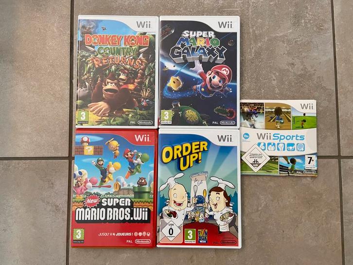 Wii-games/2 controllers en nunchuck/3 Mario Kart-stuurwielen, Games en Spelcomputers, Games | Nintendo Wii, Gebruikt, Ophalen of Verzenden