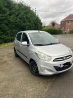 Hyundai i10 euro 5 à vendre, Auto's, Voorwielaandrijving, Euro 5, Zwart, Leder en Stof