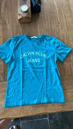 Mooi blauw shirt van Calvin Klein maat 12. Nieuwstaat, Calvin klein, Meisje, Ophalen of Verzenden, Zo goed als nieuw