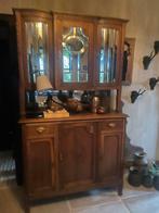 Vitrinekast met spiegelglas, Ophalen