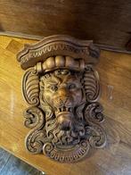 Houten ornament leeuw, Ophalen