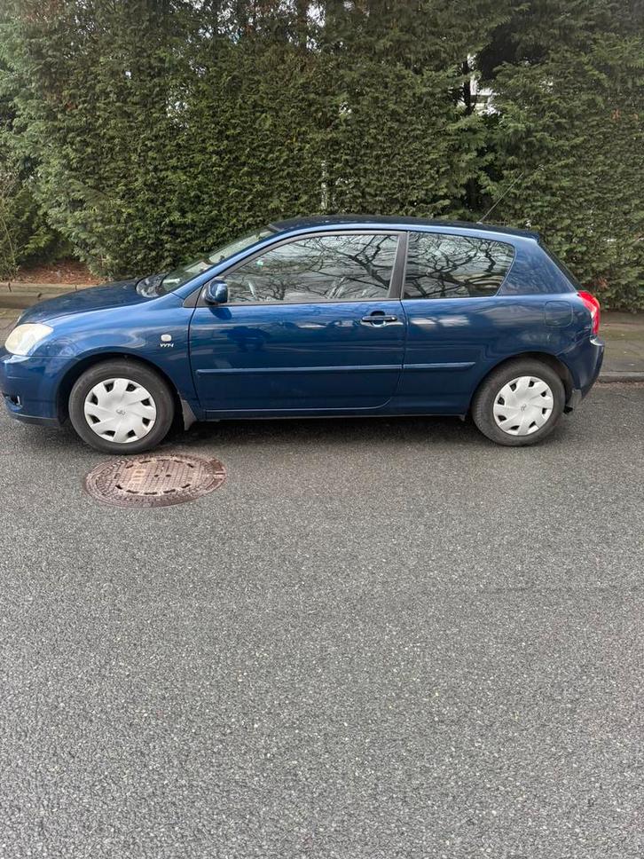 Toyota Corolla 115, Auto's, Toyota, Particulier, Corolla, Benzine, Euro 4, Coupé, 3 deurs, Automaat, Blauw, Zwart, Leder en Stof