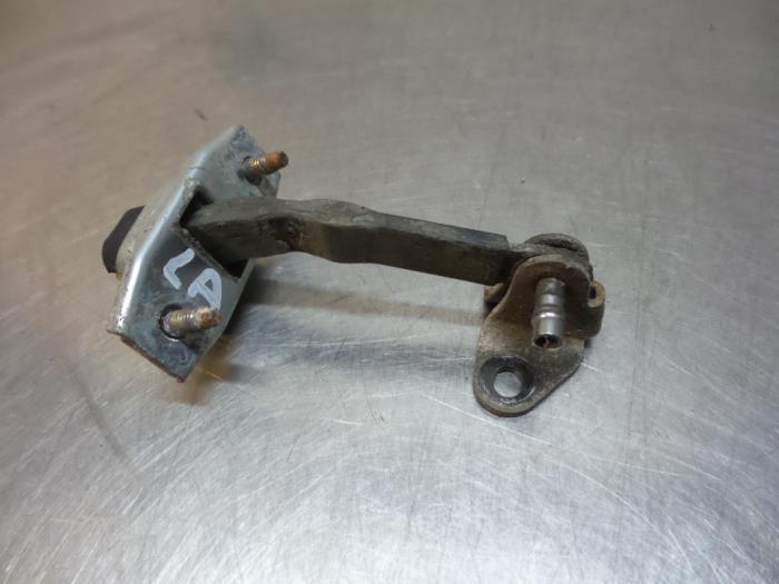 Butée 4portes arrière gauche d'un Toyota Carina (Carina E, Autos : Pièces & Accessoires, Carrosserie & Tôlerie, Toyota, Utilisé