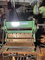 Machine trois en un, Articles professionnels