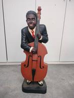 Jazzmuzikant met contrabas, Ophalen