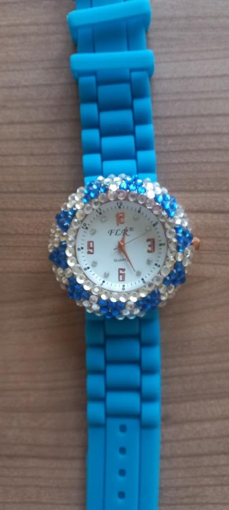 Montre vintage pour femme de la marque FLR. Comme neuve., Montre-bracelet, Autres marques, Enlèvement ou Envoi, Acier