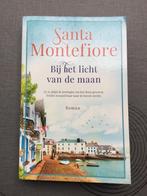Boek Santafiore: Bij het licht van de maan., Ophalen of Verzenden, Zo goed als nieuw, Santa Montefiore