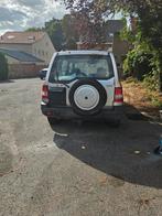 Mitsubishi pajero 2.0I Benzine 4x4 manueel suv 200.000km, Auto's, Stof, 4 cilinders, SUV of Terreinwagen, Zilver of Grijs