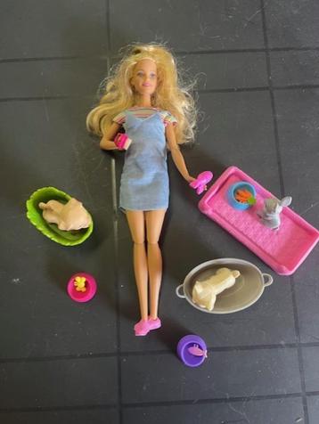 Barbie met 3 dieren om te wassen