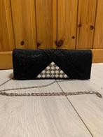 Zwarte clutch, Ophalen, Gebruikt