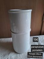 zware witte paraplubak, Ophalen