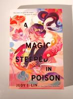 A magic steeped in poison Judy I. Lin Engels, Ophalen of Verzenden, Zo goed als nieuw