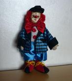 Clown pop met blauw-rode satijnen kleren, Enlèvement ou Envoi