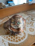 Kunstwerk kat op afgeronde steen, Ophalen