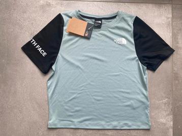 The North Face - Cropped T-Shirt. Maat S. Nieuw 