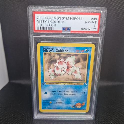 Misty's Goldeen 1st Edition Gym Heroes PSA 8, Hobby en Vrije tijd, Verzamelkaartspellen | Pokémon, Zo goed als nieuw, Ophalen of Verzenden