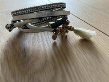 GRATIS ARMBANDJE beschikbaar voor biedingen