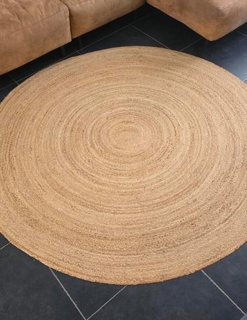 Grote ronde jute tapijt beschikbaar voor biedingen
