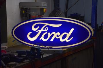 Oude lichtreclame van Ford Dealer