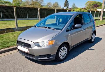 Mitsubishi Colt 1.1 Benzine - GEKEURD VOOR VERKOOP, Auto's, Voorwielaandrijving, Stof, Zwart, 5 deurs