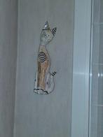 Houten poes, Ophalen