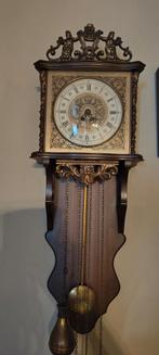Houten klokje met pendule, Ophalen