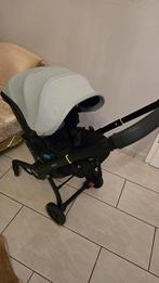 Kinderwagen Doona X – als nieuw!, Kinderen en Baby's, Buggy's, Ophalen of Verzenden, Zo goed als nieuw, Regenhoes