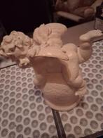 Grote engel op bol, Ophalen