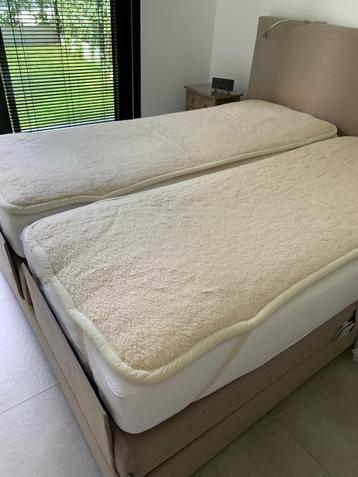 Surmatelas en laine disponible aux enchères