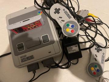 Super Nintendo SNES +2 manettes +multitap 4 joueurs + 900 je