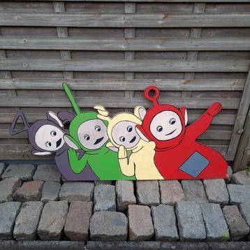 Teletubbies in hout . 130 cm x 60 cm . Goede staat .