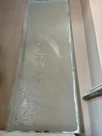 Antiek glas met pauw, Ophalen