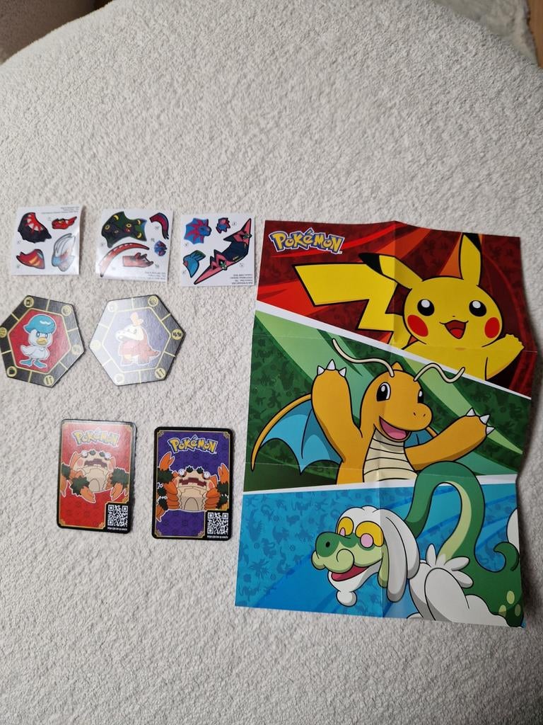 Pokemon poster, stickers en kaartjes., Enlèvement