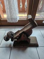 Flessenhouder hout, Enlèvement