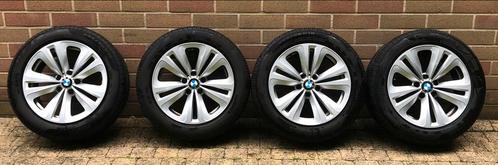 BMW velgen  7 serie 18 inch  en z.g.a.n. 245 50 r 18 banden, Auto-onderdelen, Banden en Velgen, Band(en), Zomerbanden, 18 inch