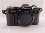 Volledig Zwarte Canon AE1 body met Originele Canon draagriem, Ophalen of Verzenden, Zo goed als nieuw, Spiegelreflex, Canon