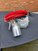 Verfspuitmachine, Ophalen