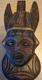 art africain : décoration ou petit masque ?, Ophalen