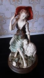 Herderin met schaap, Ophalen