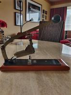 Antiek nietjes machine, Ophalen